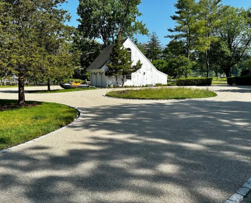 Circular driveway near white chapel