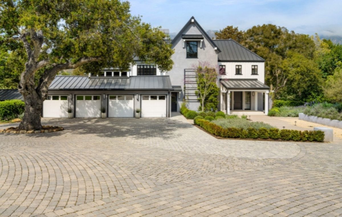 Large driveway with a brick walkway, showcasing improved curb appeal in Clinton, CT.