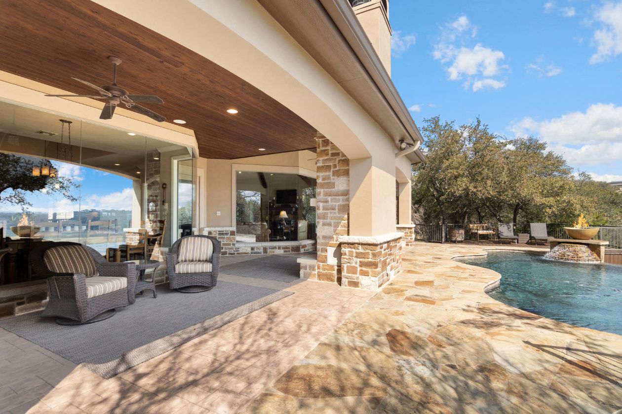 Outdoor living area designed for relaxation, featuring comfortable seating and lush landscaping in Madison, CT.