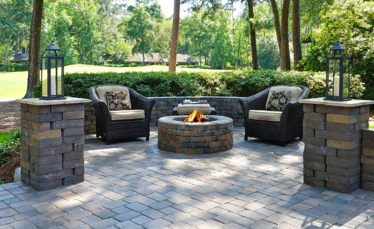 Stone patio extension with fire pit and seating area in Madison CT