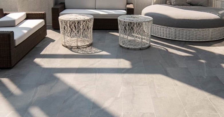 Granite stone patio with modern outdoor seating area in Connecticut