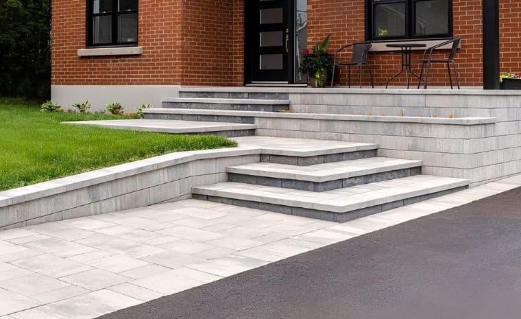 Custom stone front steps and paver walkway installed for Connecticut home exterior